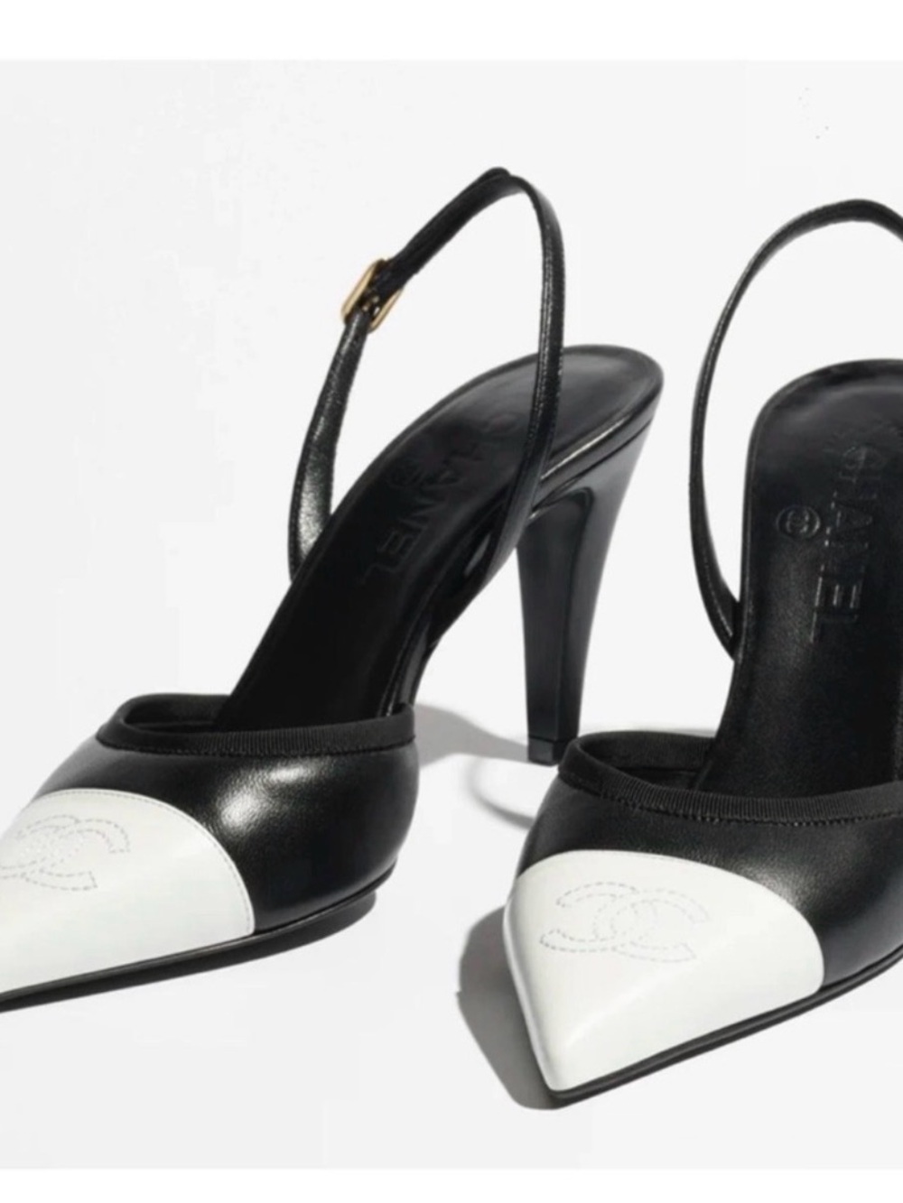 CHANEL Black Leather Slingback Pumps with White Capped Pointed Toe